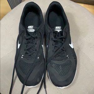Black and white nike trainers